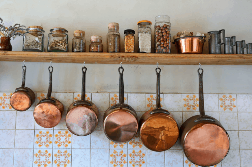 https://www.luckybelly.com/wp-content/uploads/2020/11/10-Organization-Tips-to-Keep-Pots-and-Pans-from-Being-an-Unsightly-Pile.png